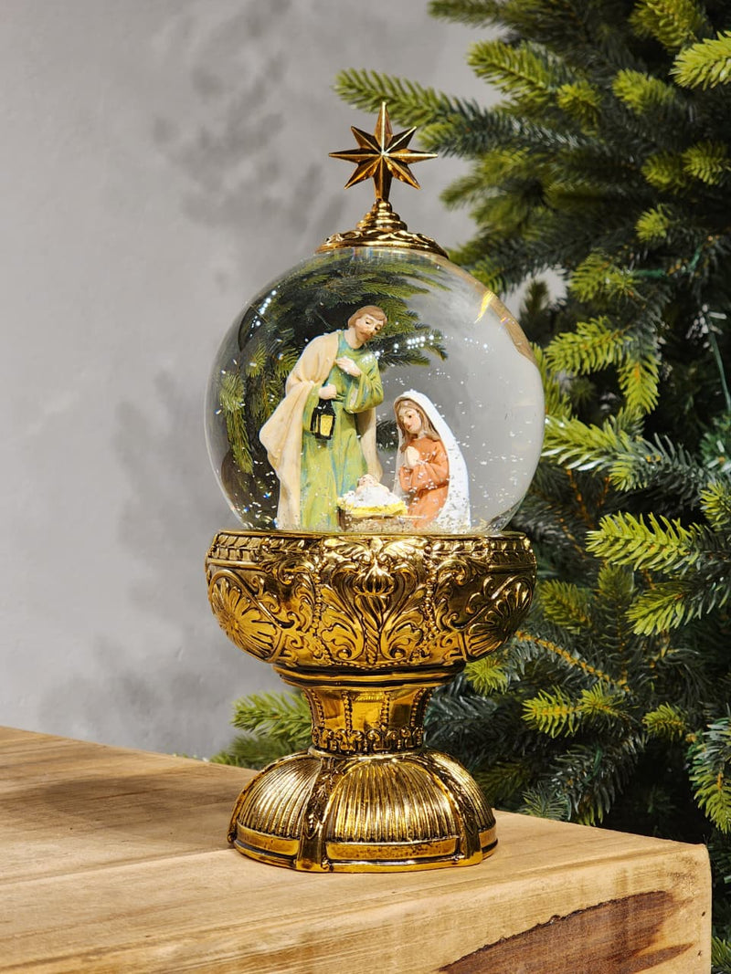 GLOBO DE NEVE COM SAGRADA FAMÍLIA DOURADO LUZ E MOVIMENTO 26,5CM